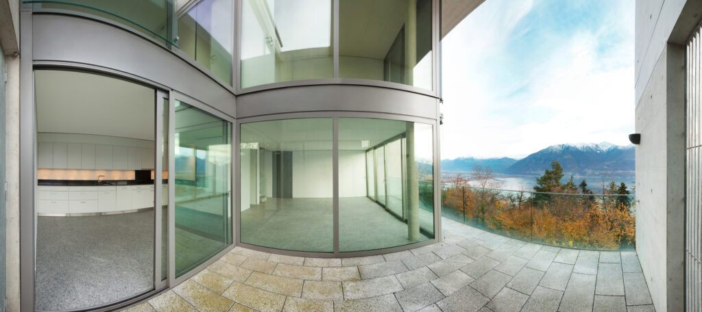 unique architecture of a building with commercial doors.
